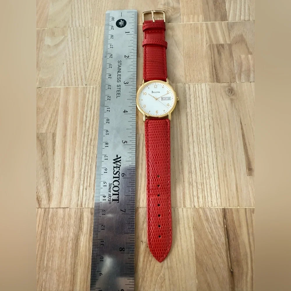 Bulova gold tone red leather watch NEW BATTERY